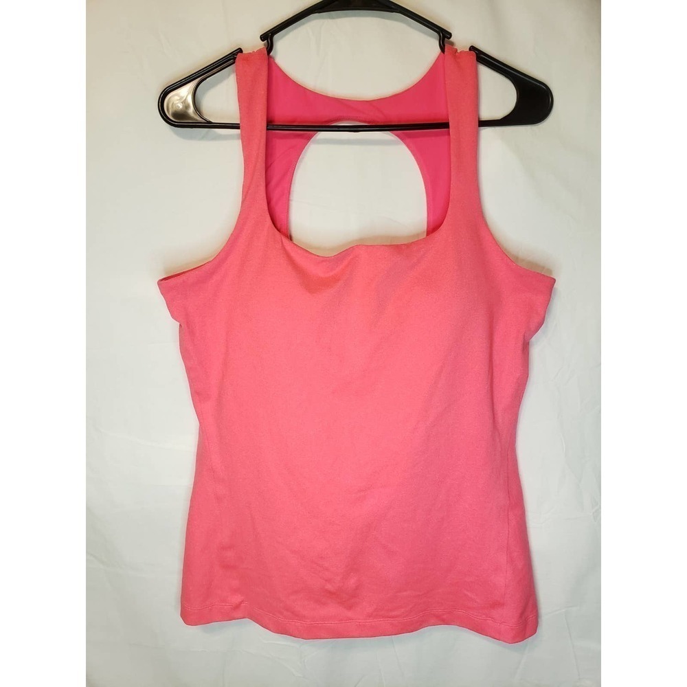 Under Armour Lg/Xl (no tag) euc. Tank. Cut out in back.
